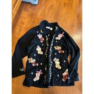 Woman’s ugly BP design Christmas cardigan